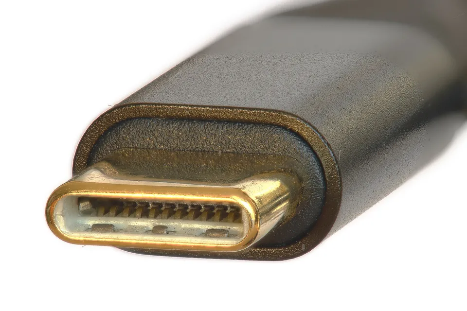 Macro photograph of a physical USB Type-C connector plug