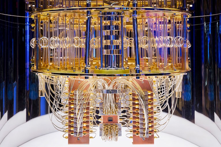 Cryogenic quantum-computing apparatus with layered metal plates and control wiring